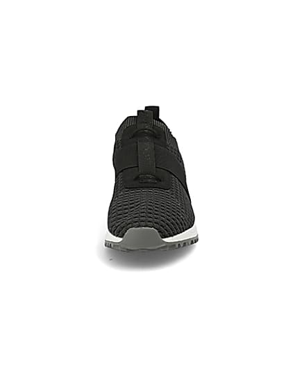 360 degree animation of product Black textured knit runner trainers frame-21