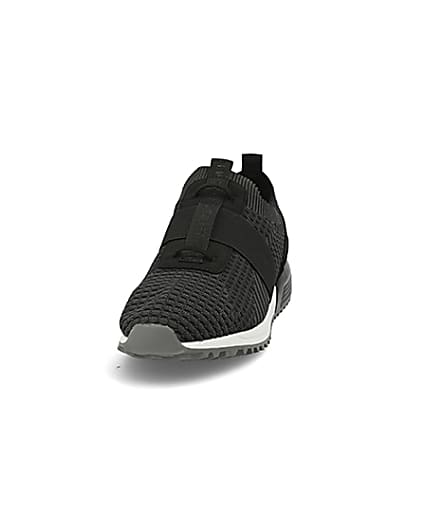360 degree animation of product Black textured knit runner trainers frame-22