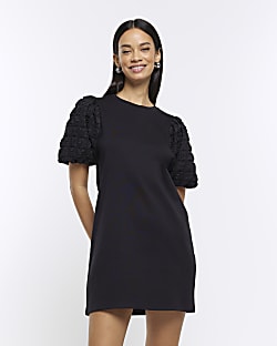Black textured puff sleeve mini t-shirt dress