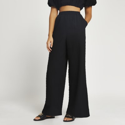 Black textured wide leg trousers