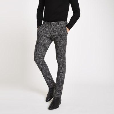 Black tile print super skinny smart trousers
