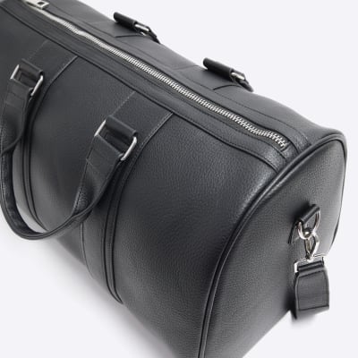 Black tumbled travel bag River Island