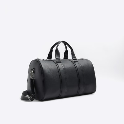 Black tumbled travel bag River Island