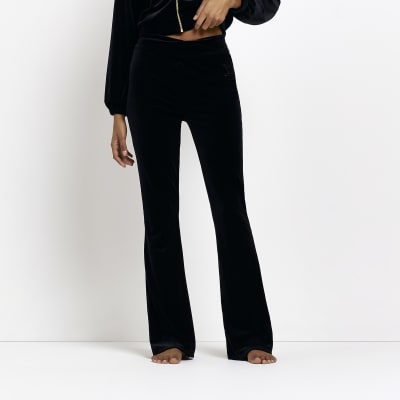 Black velour flared trousers | River Island