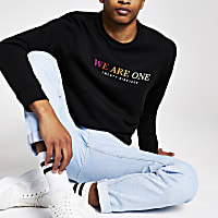 Black 'we are one' Pride sweatshirt