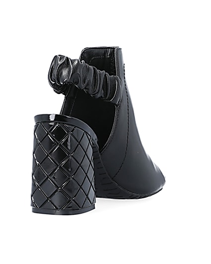 360 degree animation of product Black wide fit heeled ankle boots frame-11
