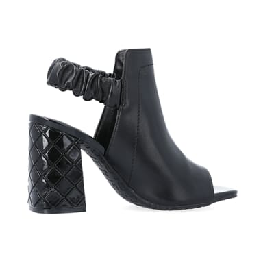 360 degree animation of product Black wide fit heeled ankle boots frame-14