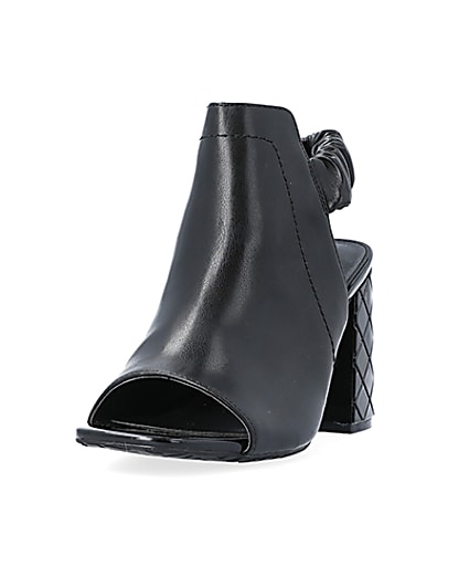 360 degree animation of product Black wide fit heeled ankle boots frame-23