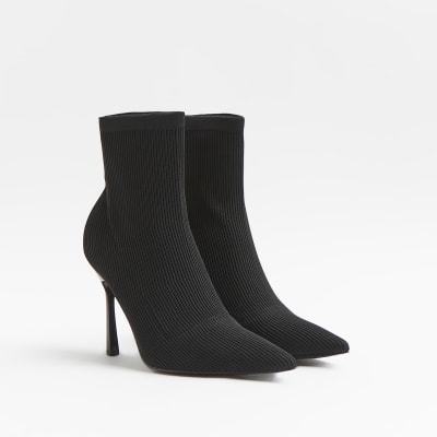 Black wide fit heeled sock boots | River Island
