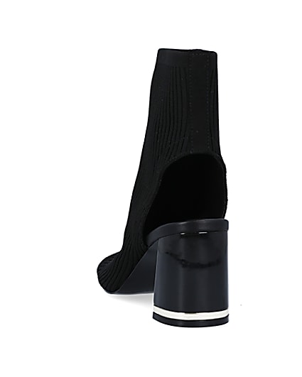 360 degree animation of product Black wide fit knit heeled ankle boots frame-8