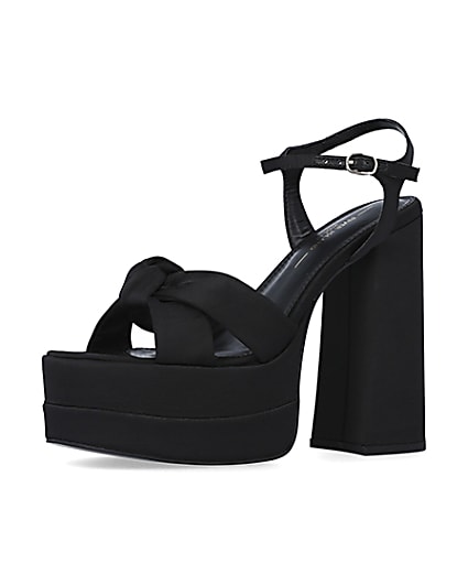 360 degree animation of product Black wide fit knot platform heels frame-1