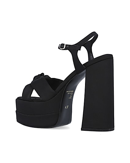 360 degree animation of product Black wide fit knot platform heels frame-5