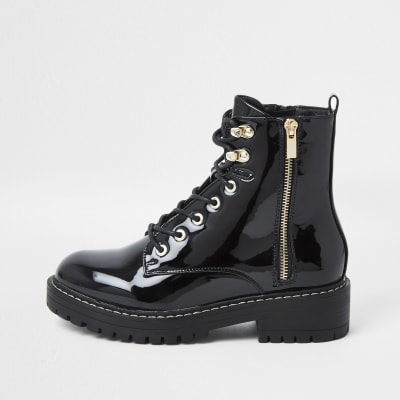 high cut black leather shoes