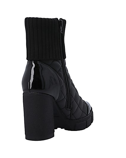 360 degree animation of product Black wide fit quilted heeled ankle boots frame-11
