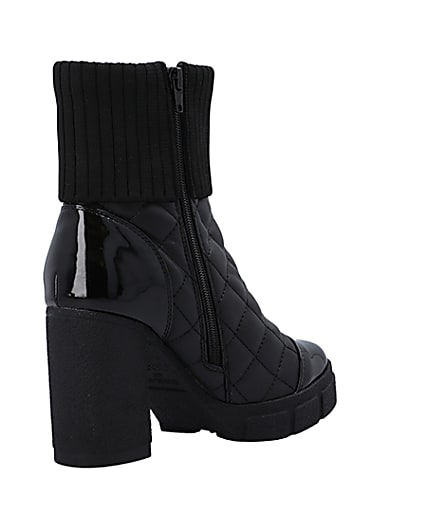 360 degree animation of product Black wide fit quilted heeled ankle boots frame-12