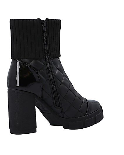 360 degree animation of product Black wide fit quilted heeled ankle boots frame-13