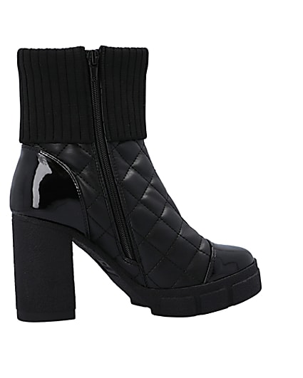 360 degree animation of product Black wide fit quilted heeled ankle boots frame-14