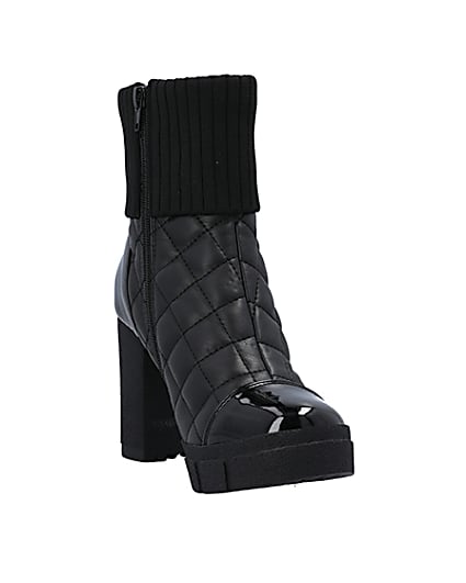 360 degree animation of product Black wide fit quilted heeled ankle boots frame-19