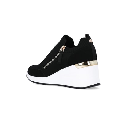 360 degree animation of product Black wide fit slip on wedge trainers frame-6