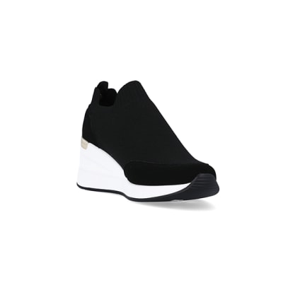360 degree animation of product Black wide fit slip on wedge trainers frame-19