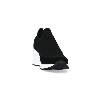 360 degree animation of product Black wide fit slip on wedge trainers frame-20