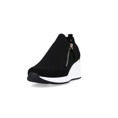 360 degree animation of product Black wide fit slip on wedge trainers frame-23