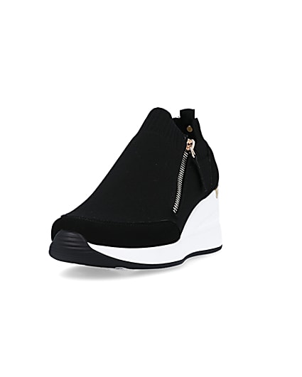 360 degree animation of product Black wide fit slip on wedge trainers frame-23