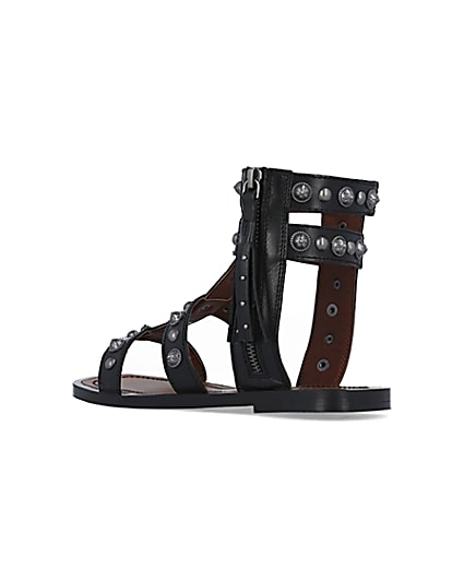 360 degree animation of product Black wide fit studded gladiator sandals frame-6
