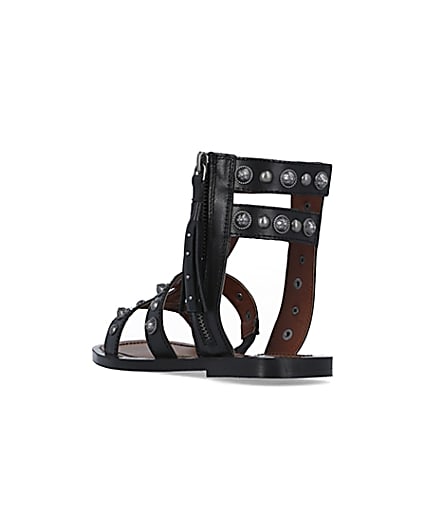 360 degree animation of product Black wide fit studded gladiator sandals frame-7