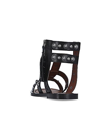 360 degree animation of product Black wide fit studded gladiator sandals frame-8