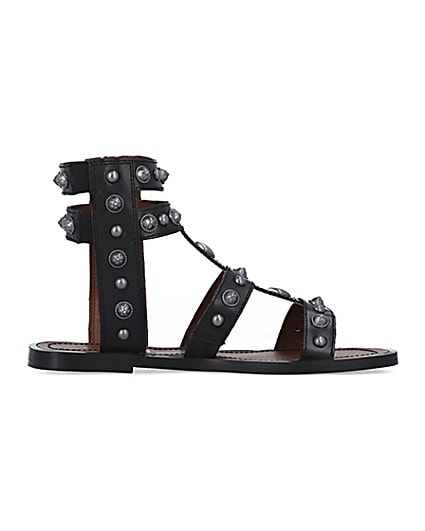 360 degree animation of product Black wide fit studded gladiator sandals frame-15