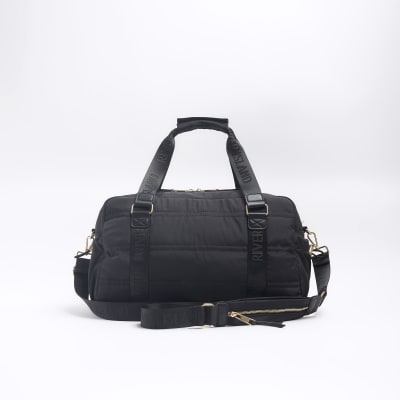 Black zip pocket travel bag River Island