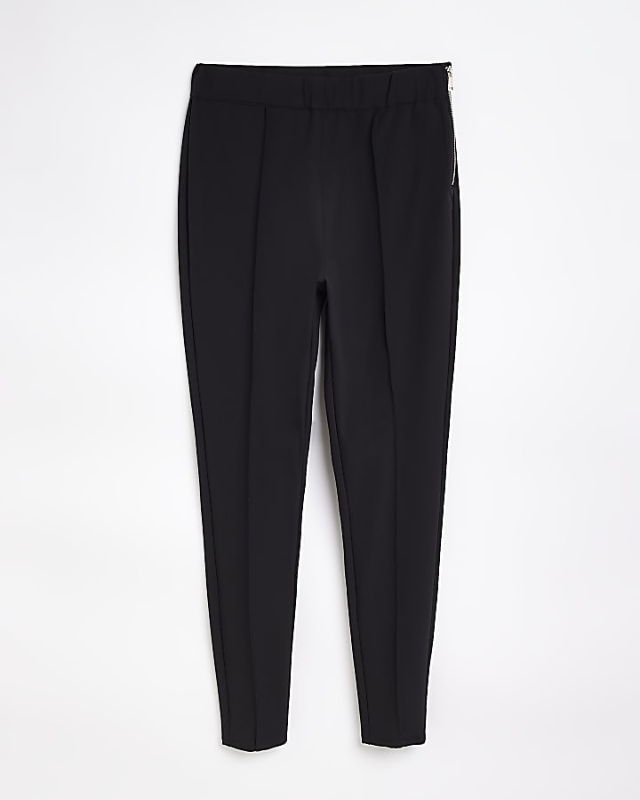 Black zip skinny trousers