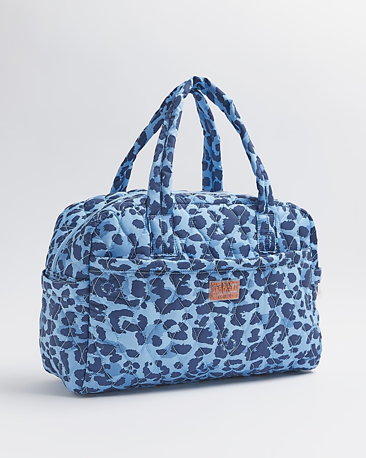 Blue animal print quilted weekend bag