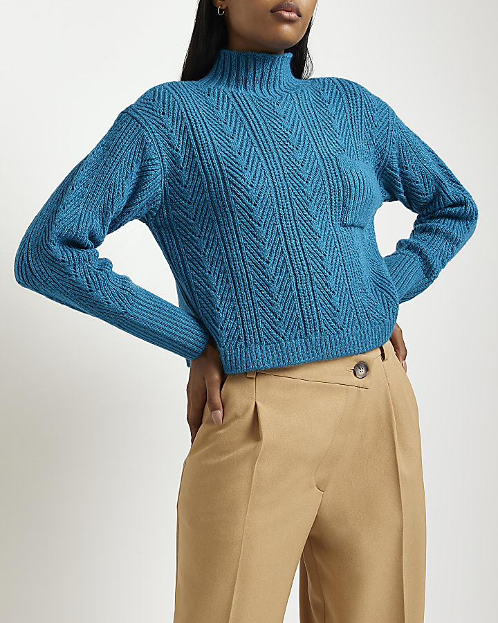 Blue cable knitted jumper