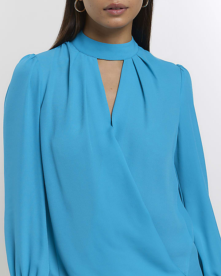 Blue cut out wrap blouse