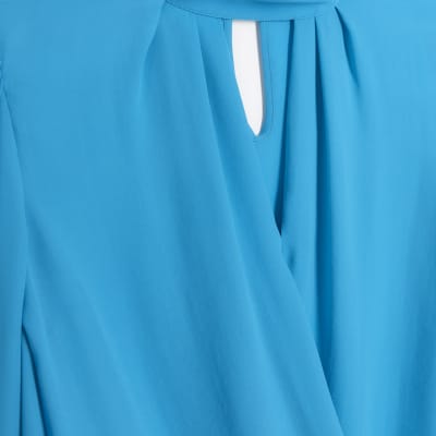Blue cut out wrap blouse