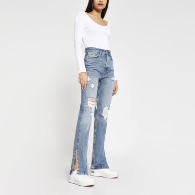 split hem blue jeans