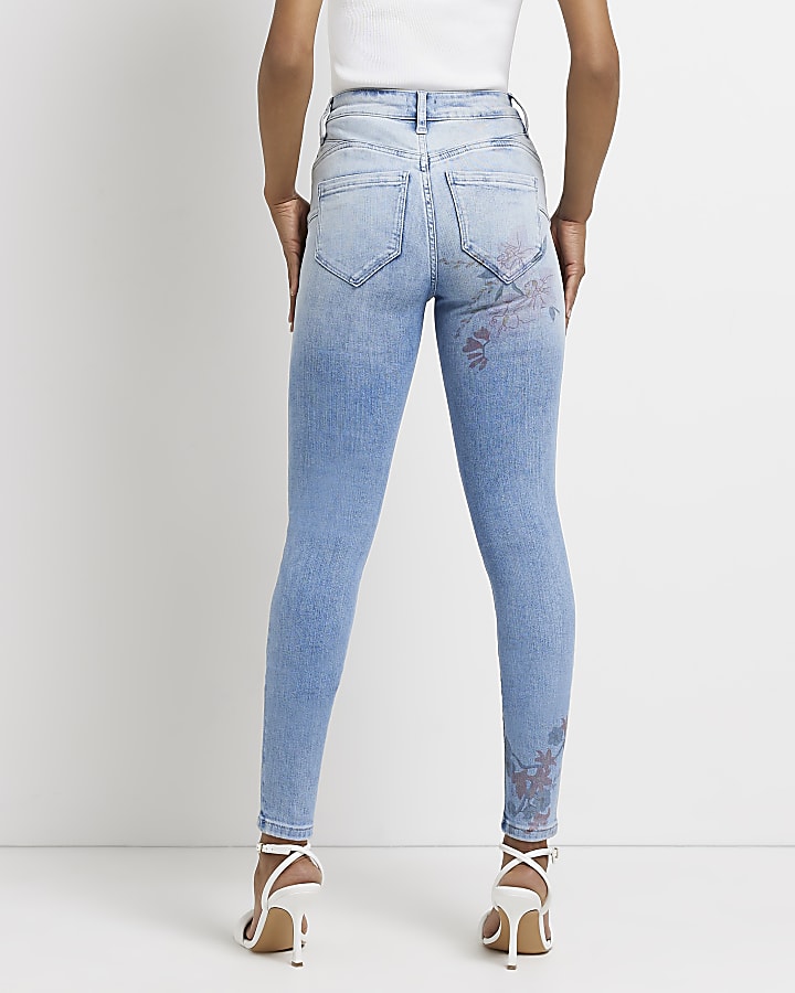 Blue floral high waisted skinny jeans