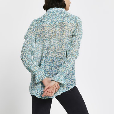 Blue floral tie neck shirt