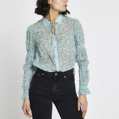 Blue floral tie neck shirt