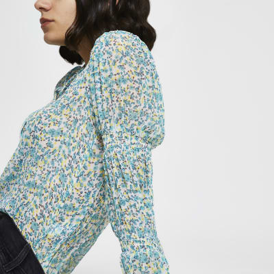 Blue floral tie neck shirt