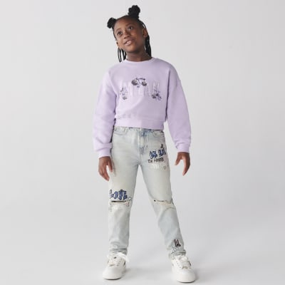 Blue graffiti ripped jeans River Island