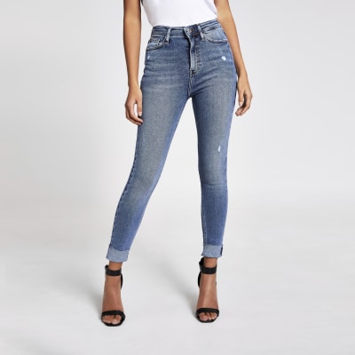 jeans with white fringe on the side