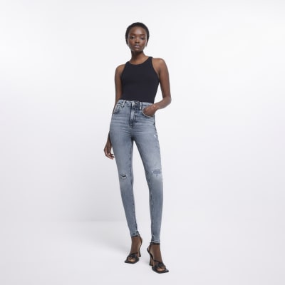 women ripped jeans