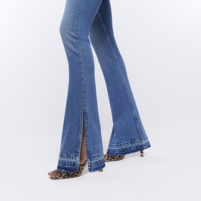 Blue high waisted split hem flared jeans River Island