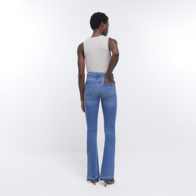 Blue high waisted split hem flared jeans River Island