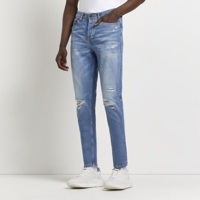 tapered distressed jeans