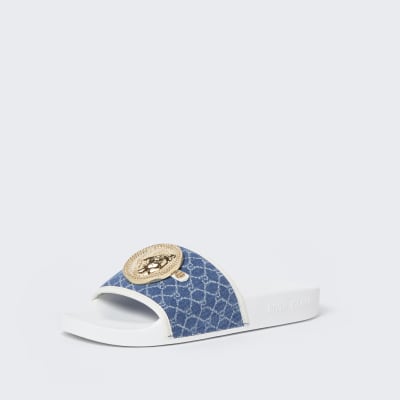 Blue lion head RI monogram sliders