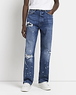 Blue loose fit paint splatter ripped jeans